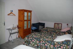 Maisons de vacances Etape detente a la campagne (logement climatise) : photos des chambres