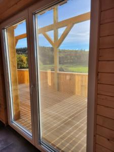 Chalets Gites Jura Sud : photos des chambres