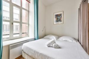 Appartements Superbe appartement spacieux au Vieux-Lille : photos des chambres