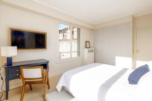Appartements Appartement luxueux vue mer a Deauville avec services : photos des chambres