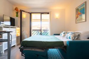 Appartements Studio pour 2 a 4 personnes sous les Pins climatise : photos des chambres