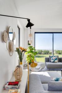 Garden Seaside Villa by CadenzaLux