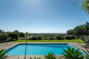 Garden Seaside Villa by CadenzaLux