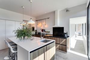 Garden Seaside Villa by CadenzaLux