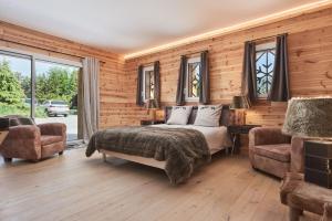 Chalets Luxueux chalet avec terrasse : photos des chambres