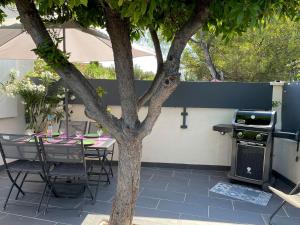 Maisons de vacances Key Largo villa 2p avec pkg clim grande terrasse avec jacuzzi proche port et plage : photos des chambres