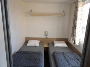 Campings Mobil-Home terrasse Semi-Couverte : photos des chambres