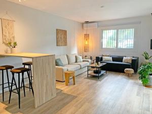 Bungalow with large terrace in a quiet park - beach nearby