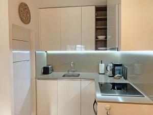 Bungalow with large terrace in a quiet park - beach nearby