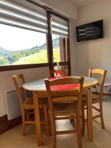 Appartements Appartement duplex avec vue sur le domaine skiable : photos des chambres