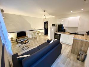 Appartements Patio, Jacuzzi Professionnel, Table de Massage, Climatise, Le Cocon de Pedro : photos des chambres