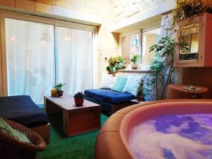 Maisons de vacances Les nids de la tour - Spa prive - wifi : photos des chambres