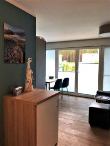 Ferienwohnung KWi 79 EG "Seeschwalbe im Küstenwald"