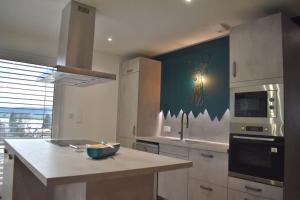 Appartements Sur le Lac - Sauna & vue lac : photos des chambres