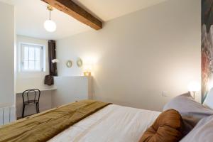 Appartements Sur la place , centre village cosy & calme 2CH : photos des chambres