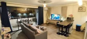 Charmant F2 à SkyNui, piscine de 25m et vue mer - 阿鲁埃