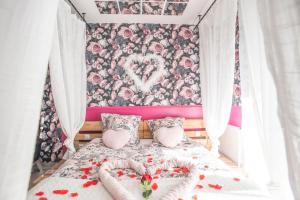 Appartements Romantisme et glamour 2 avec spa , clim et jardin : photos des chambres