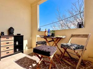 Appartements Le Coin de Mer 2, Bord de mer, Plage 30m, Cosy, CLIM, Wifi, 4 personnes : photos des chambres