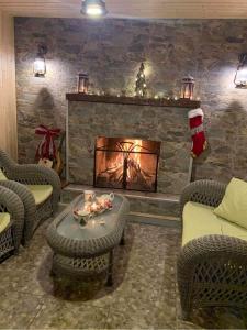 კოტეჯი ბახმაროში WoodenHouse Sunrise