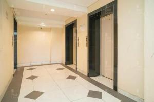 RedLiving Apartemen 19 Avenue - Amanah Room
