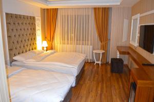 Luxury Triple Room room in Snowflake Dag Hotel