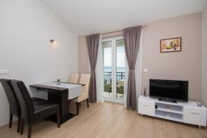 Apartment in Brela with sea view, terrace, air conditioning, WiFi 5122-1 