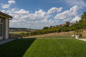 Villas Mas des Coteaux - vue panoramique - piscine - babyfoot - pingpong - petanque & espace enfants a 1h de MONTAUBAN : photos des chambres