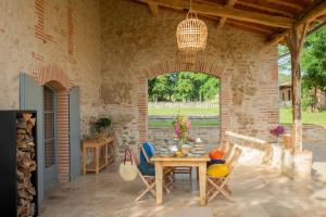 Maisons de vacances L'Heritier, maison climatisee, 12pers avec piscine : photos des chambres