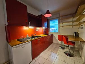 Appartements T2 Parc & Cite Internationale : photos des chambres