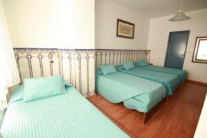 Double or Twin Room with Two Extra Beds room in Residencial Joao XXI