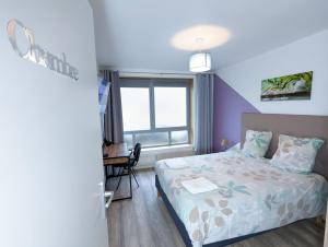 Appartements Beau-Jean, Un Cocon Sympa 5 min a Pied du Centre-Ville, Parking Prive, a 10 min du CHU : photos des chambres