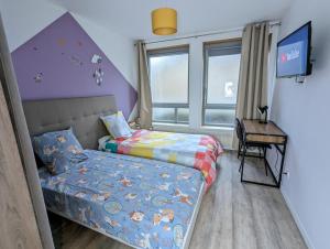 Appartements Beau-Jean, Un Cocon Sympa 5 min a Pied du Centre-Ville, Parking Prive, a 10 min du CHU : photos des chambres