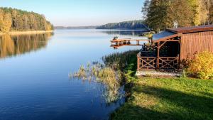 Domki Mazurskie w Ogrodach Złotej Łani Wiartel - Klimatyczne Apartamenty i Pokoje Widokowe