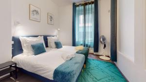 Appartements Le Beau Bourg *** : photos des chambres