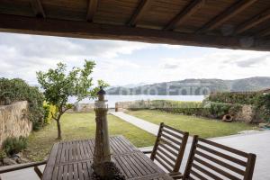 L324 - Bilocale con giardino e vista mare panoramica a Porto Mannu