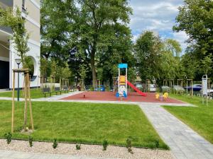 Komfortowy apartament z garażem i balkonem Platany