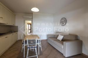 L325 - Bilocale con giardino e vista mare panoramica a Porto Mannu