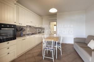 L325 - Bilocale con giardino e vista mare panoramica a Porto Mannu