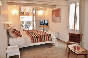 Appartements les Chambres Tropeziennes : photos des chambres