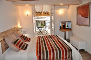 Appartements les Chambres Tropeziennes : photos des chambres