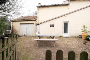 Maisons de vacances LaConciergerieJonzac, Maison L'Hacienda avec parc de 3000m2 : photos des chambres