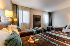 Hotels Helgon Hotel - Lourdes Pyrenees : photos des chambres