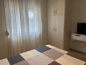 CASA MILITOU-NEA FILADELFIA