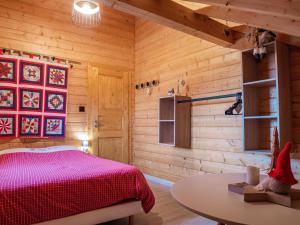 Chalets Le Chalet au vieux vignoble avec espace Sauna et Jacuzzi : photos des chambres