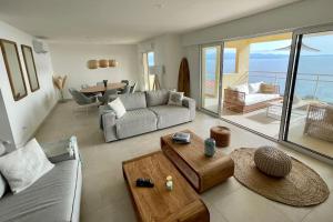 Appartements Paillote Perchee a 180 ° sur la mer : photos des chambres