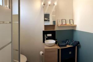 Appartements La petite Boutique Bleue : photos des chambres