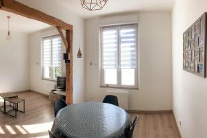 Appartements La petite Boutique Bleue : photos des chambres