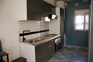 Appartements La petite Boutique Bleue : photos des chambres
