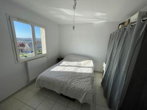 Appartements Belle maison proche centre ville : photos des chambres