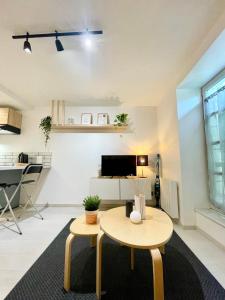Appartements Grand studio Hyper centre WIFI : photos des chambres